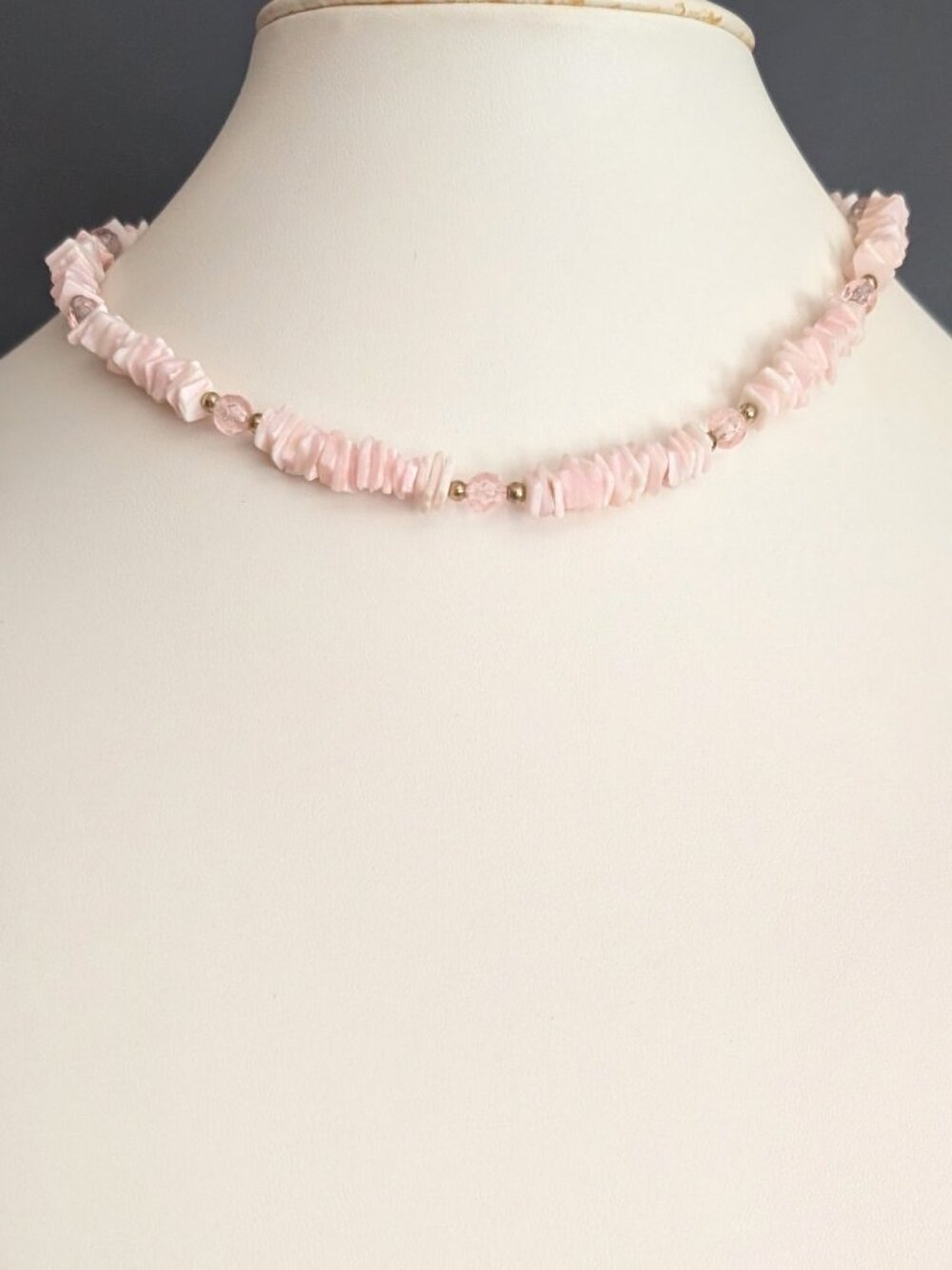 Dyed pink shell, white shell, pink bead and gold tone accent necklace